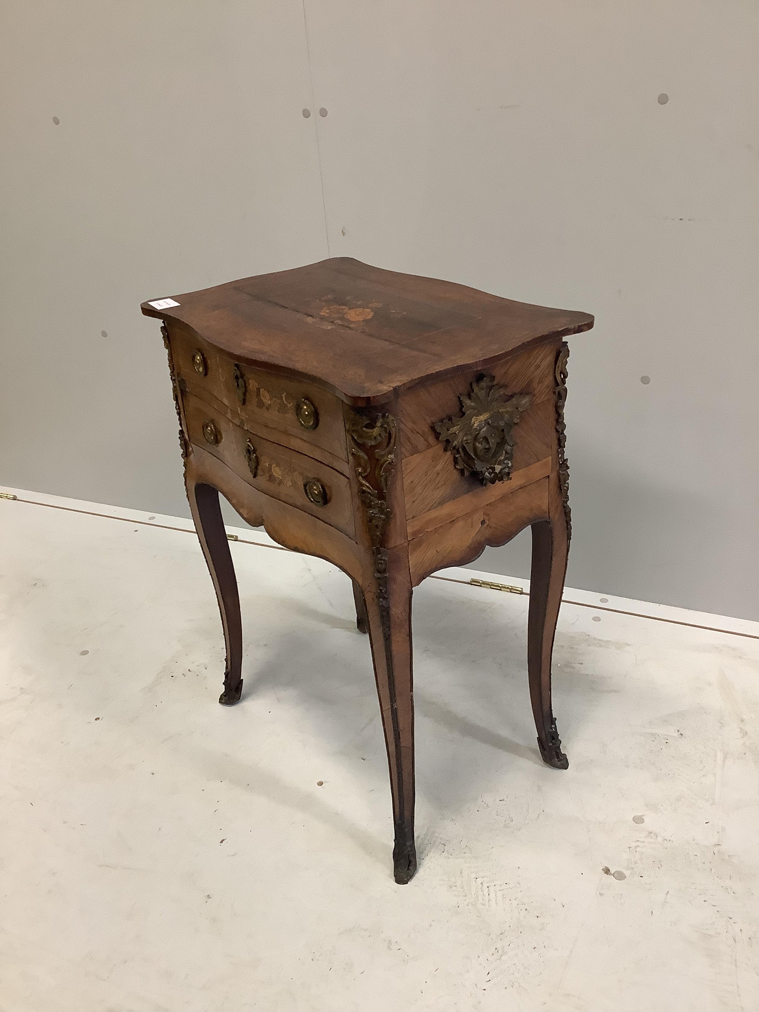 A French marquetry inlaid serpentine side table fitted with two drawers, width 53cm, depth 35cm, height 70cm